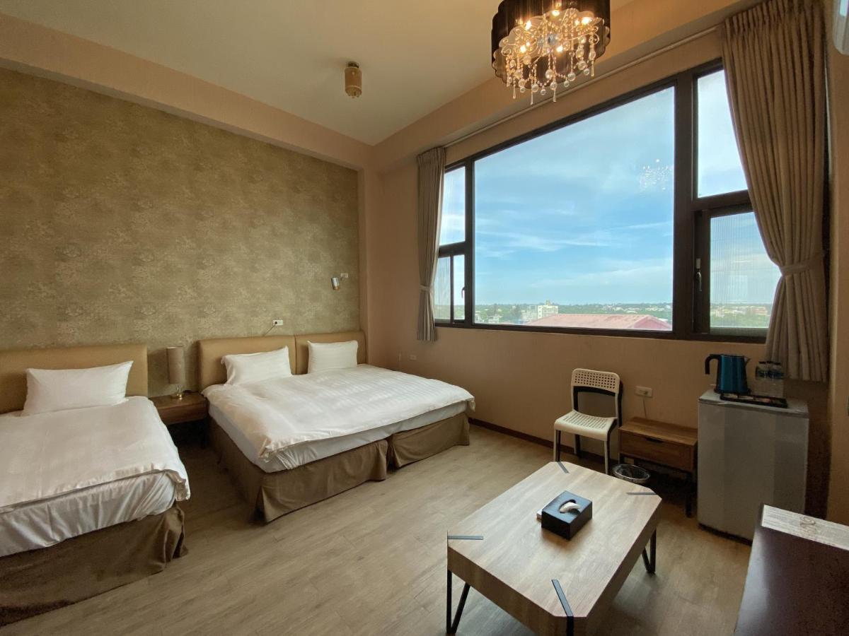 In99 Hotel Цзіньчен Екстер'єр фото